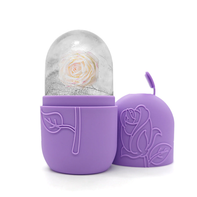 Hand holding the facial ice roller by its handle